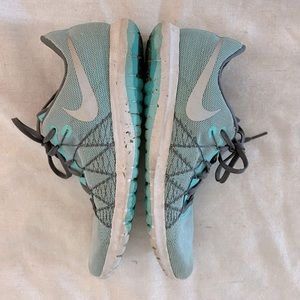 Nike light teal stunning sneakers. Size 8.5.
